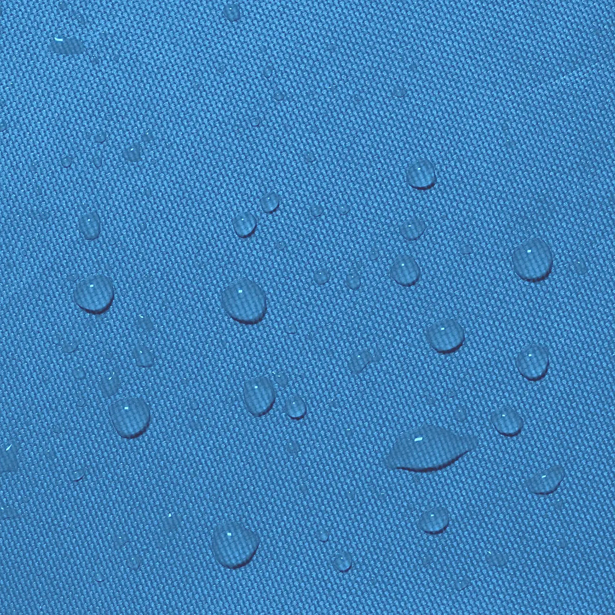 Water beads on blue waterproof 600D polyester sailboat boom cover fabric