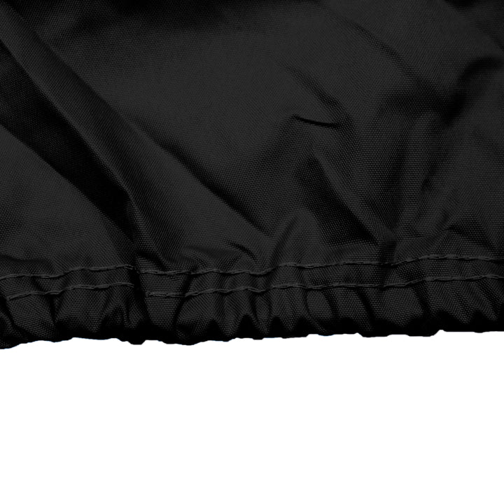 Secure black elastic cord with double stitches to create reinforced seams around bottom hem of UTV cover for storage.