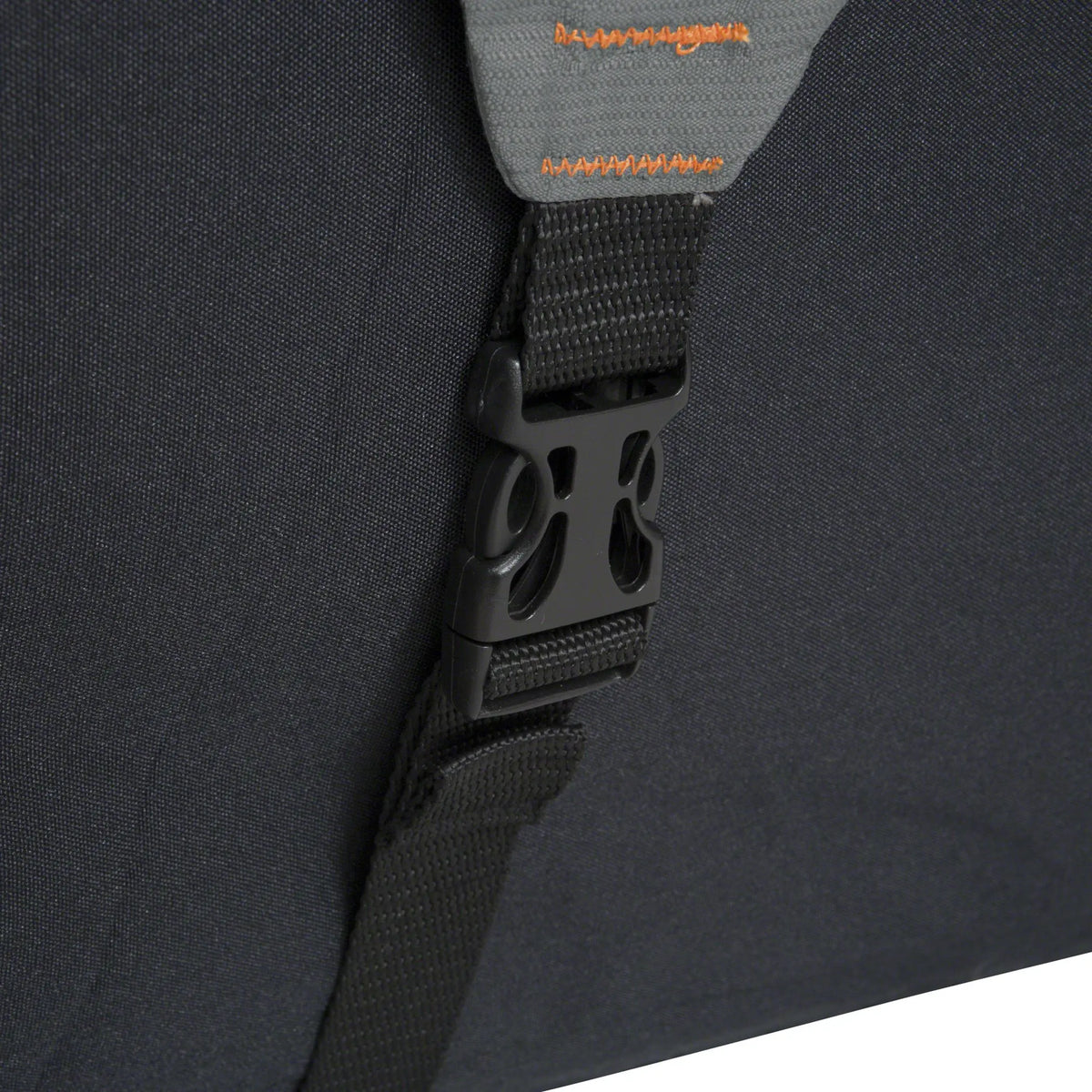 Close-up of integrated trailering system on a vehicle cover, featuring adjustable cinch straps, quick-adjusting straps, side-release buckles, and front slots designed for secure tie-downs during transport.