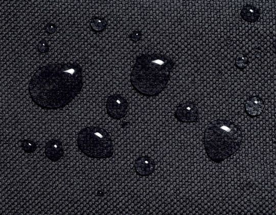 Close up of water-resistant heavy duty fabric that is UV treated and breathable, and can protect against sun, rain, snow, dirt, and pollutants.
