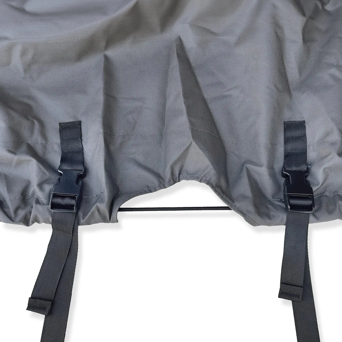 Gray fabric with black straps on a white background showing the elastic band.