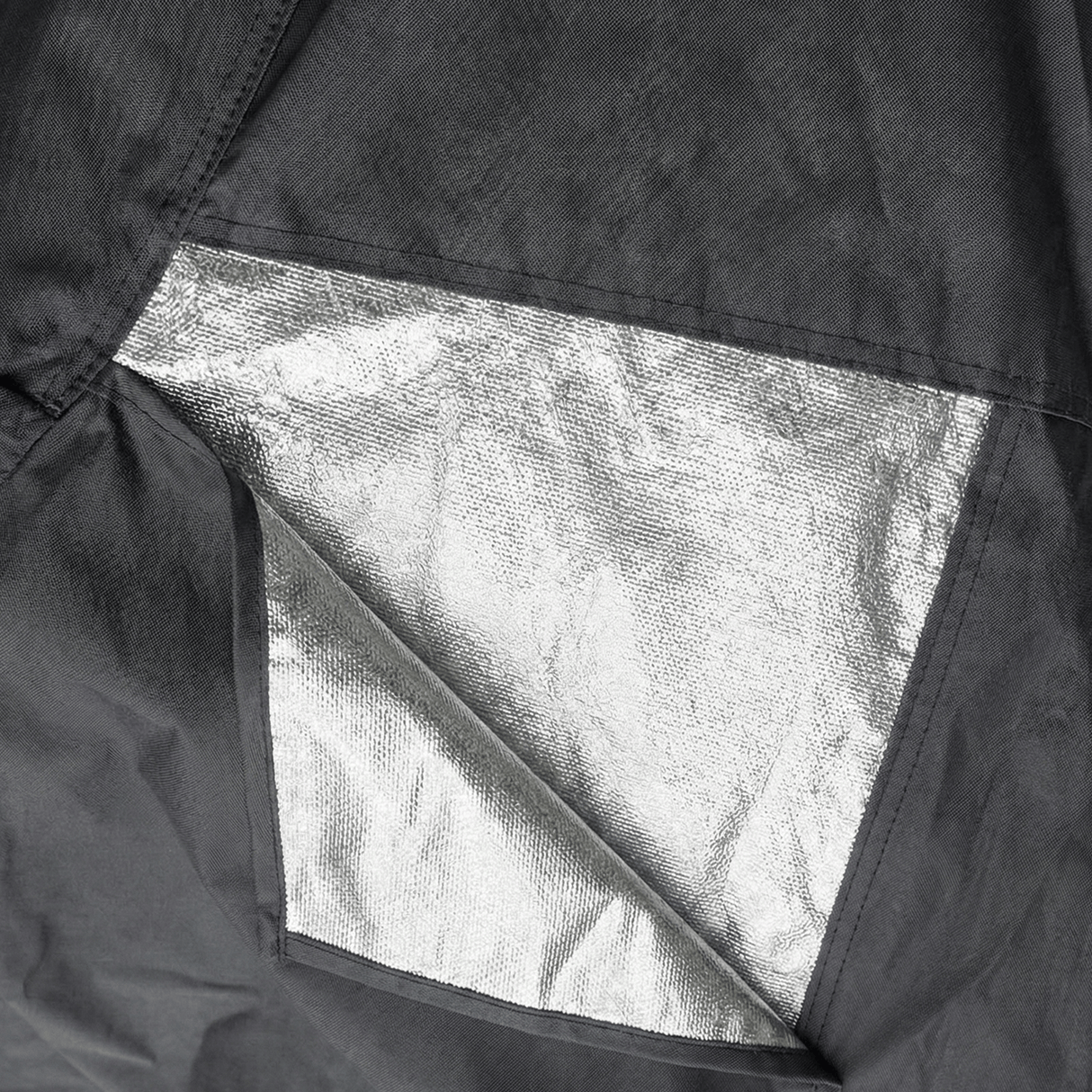 Detailed view of heavy duty, metallic heat shield fabric panels that guard against hot exhaust damage.