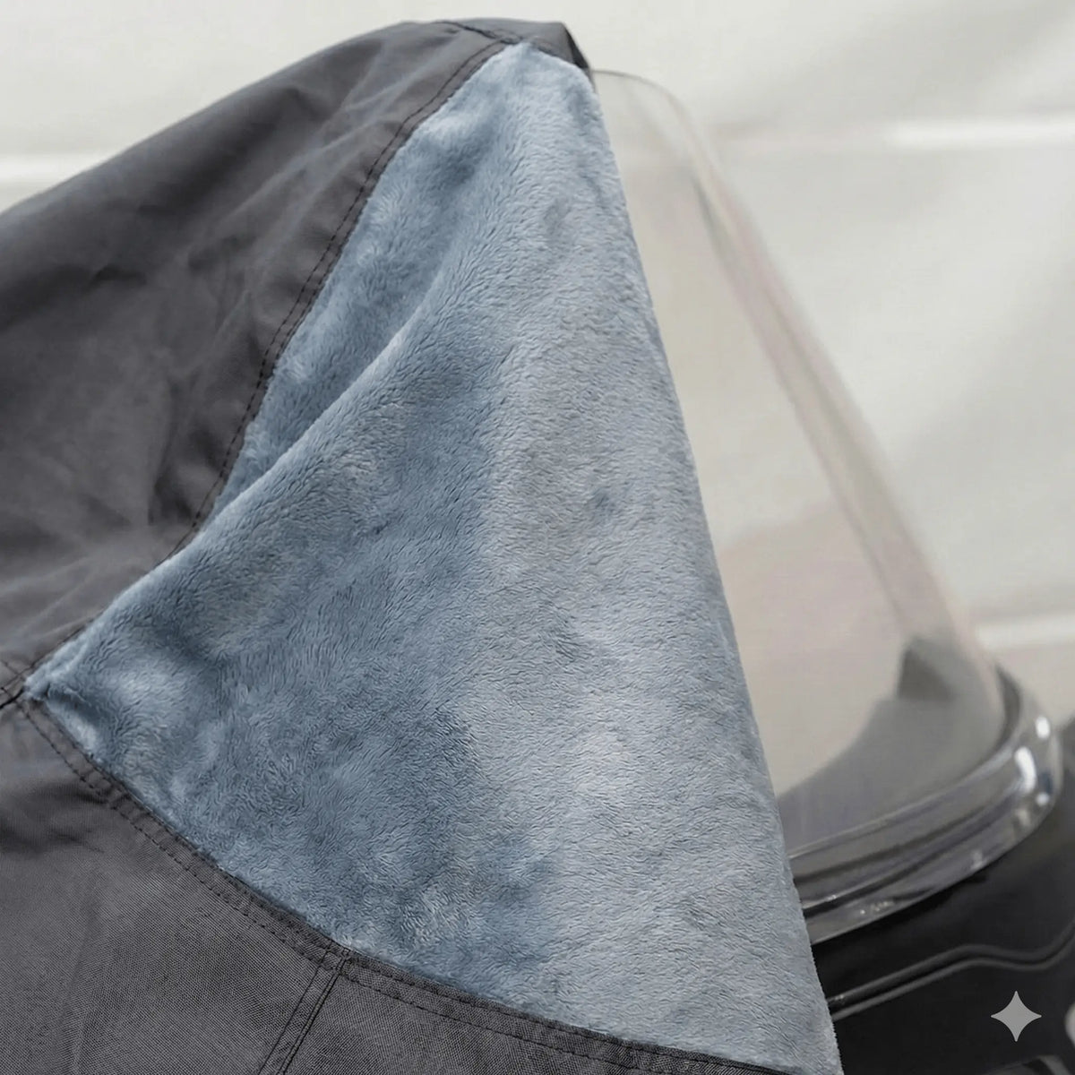 Close-up view of the non-scratch inner fleece lining inside the cover, designed to protect the windshield and painted surfaces from abrasions, scuffs, and wear during storage.