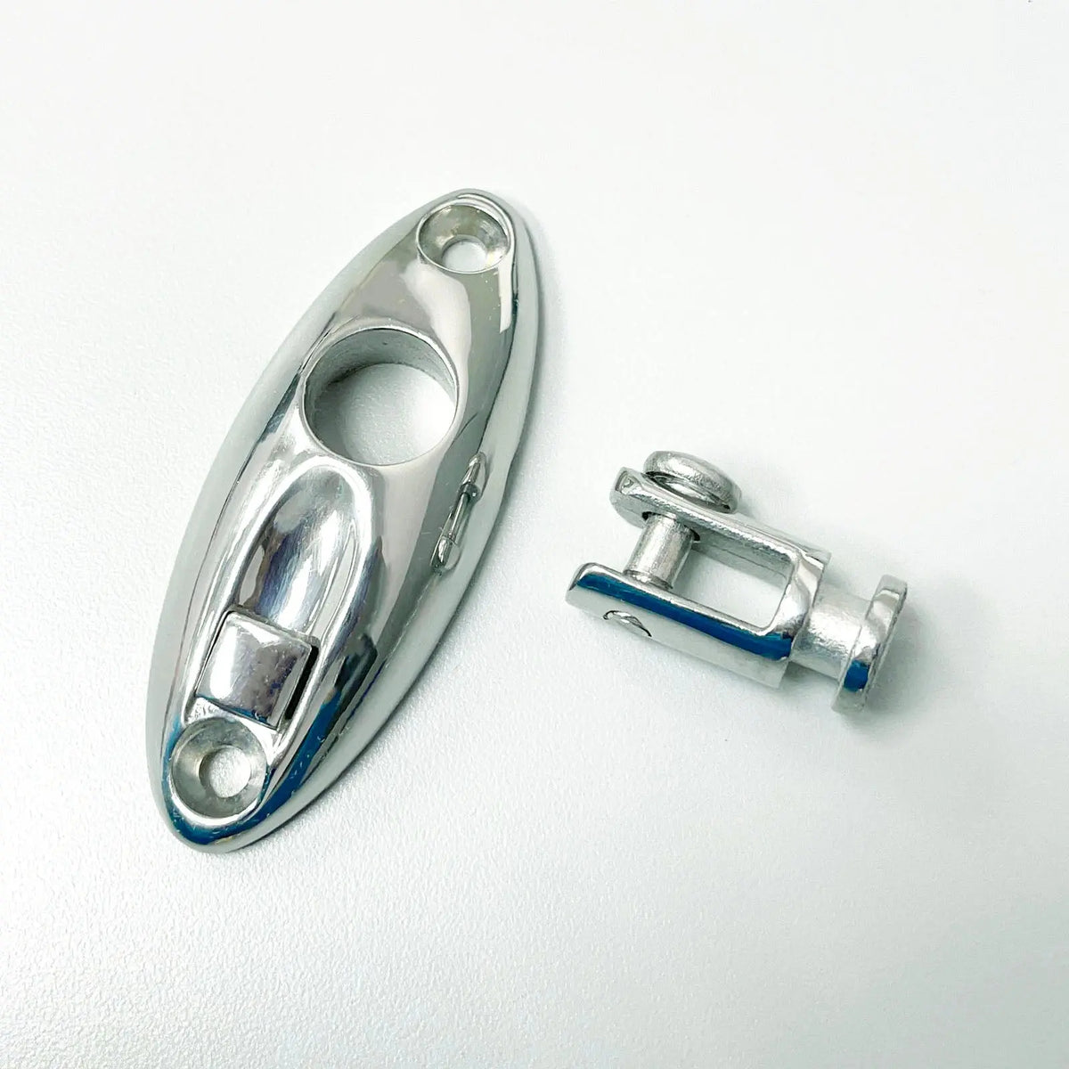 Close-up of stainless steel quick release swivel hinge deck side mounts with removable pin and polished finish.