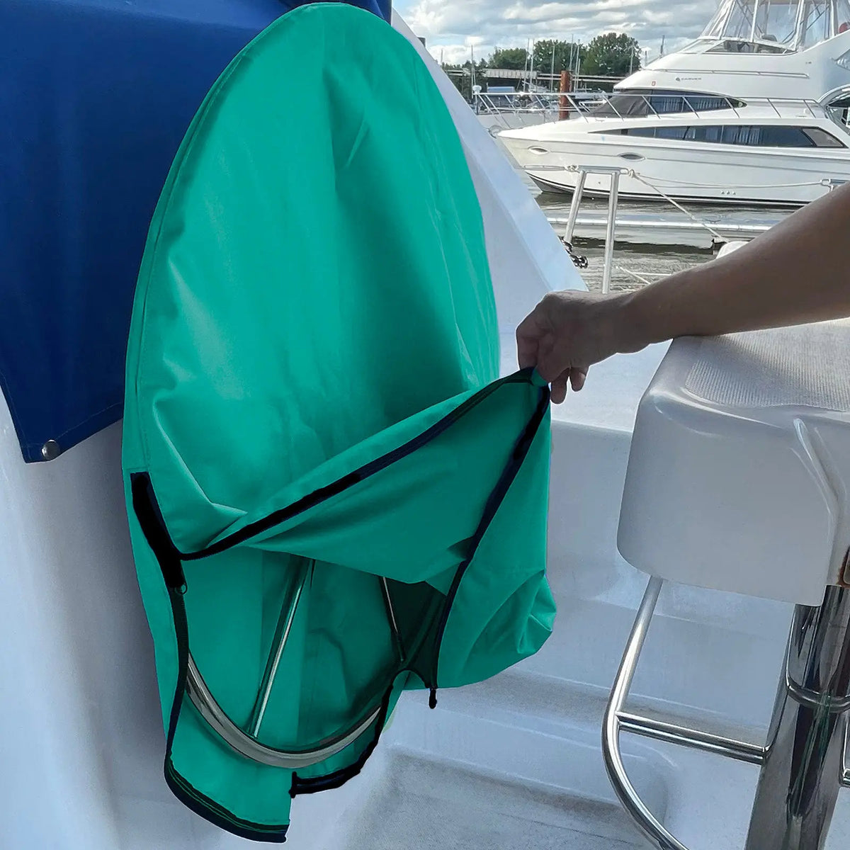 SAVVYCRAFT® teal waterproof boat steering wheel cover on boat wheel with half-open zipper for easy installation and secure fit
