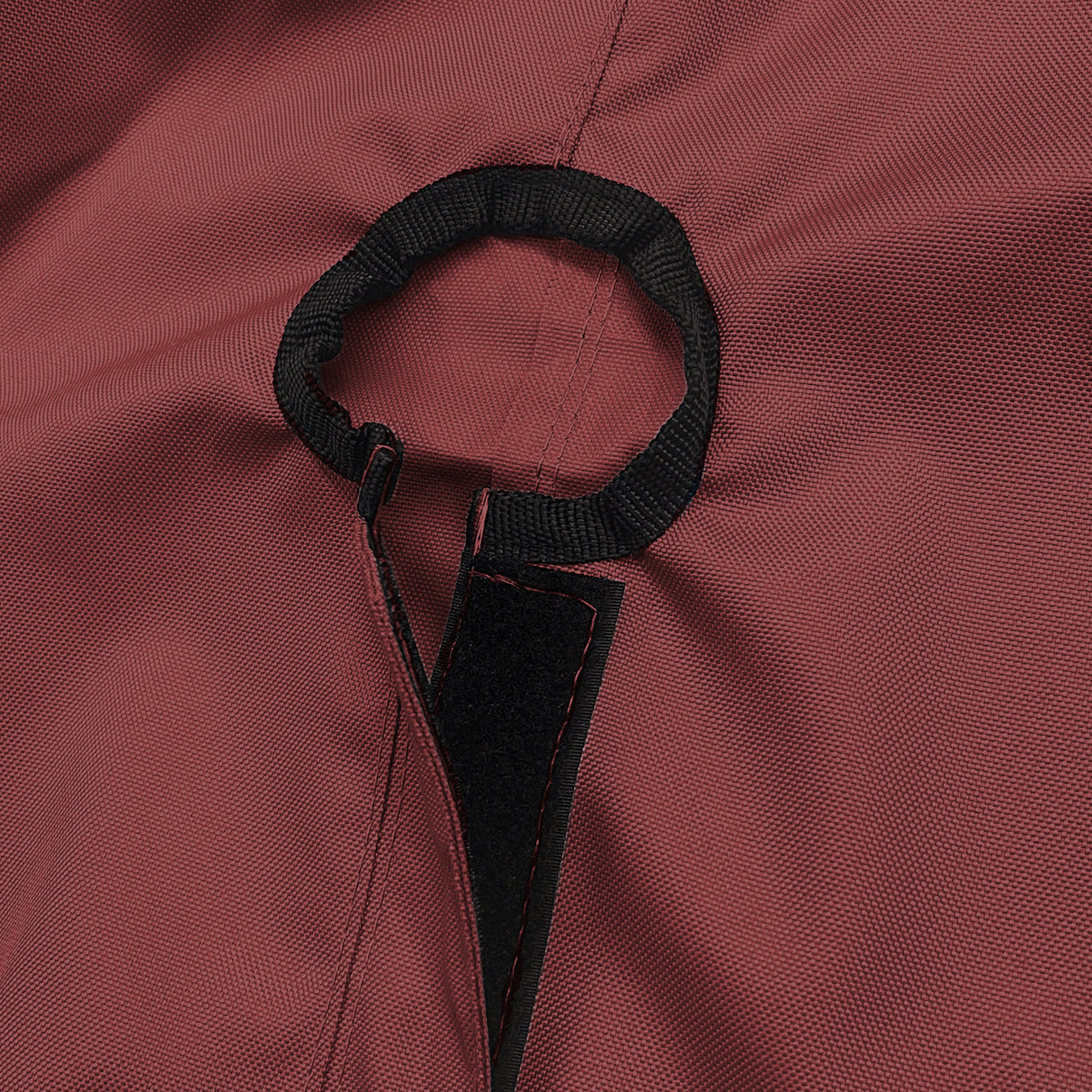 Close-up of SAVVYCRAFT® burgundy waterproof boat steering wheel cover showing elastic opening and reinforced fastening strap for secure marine fit