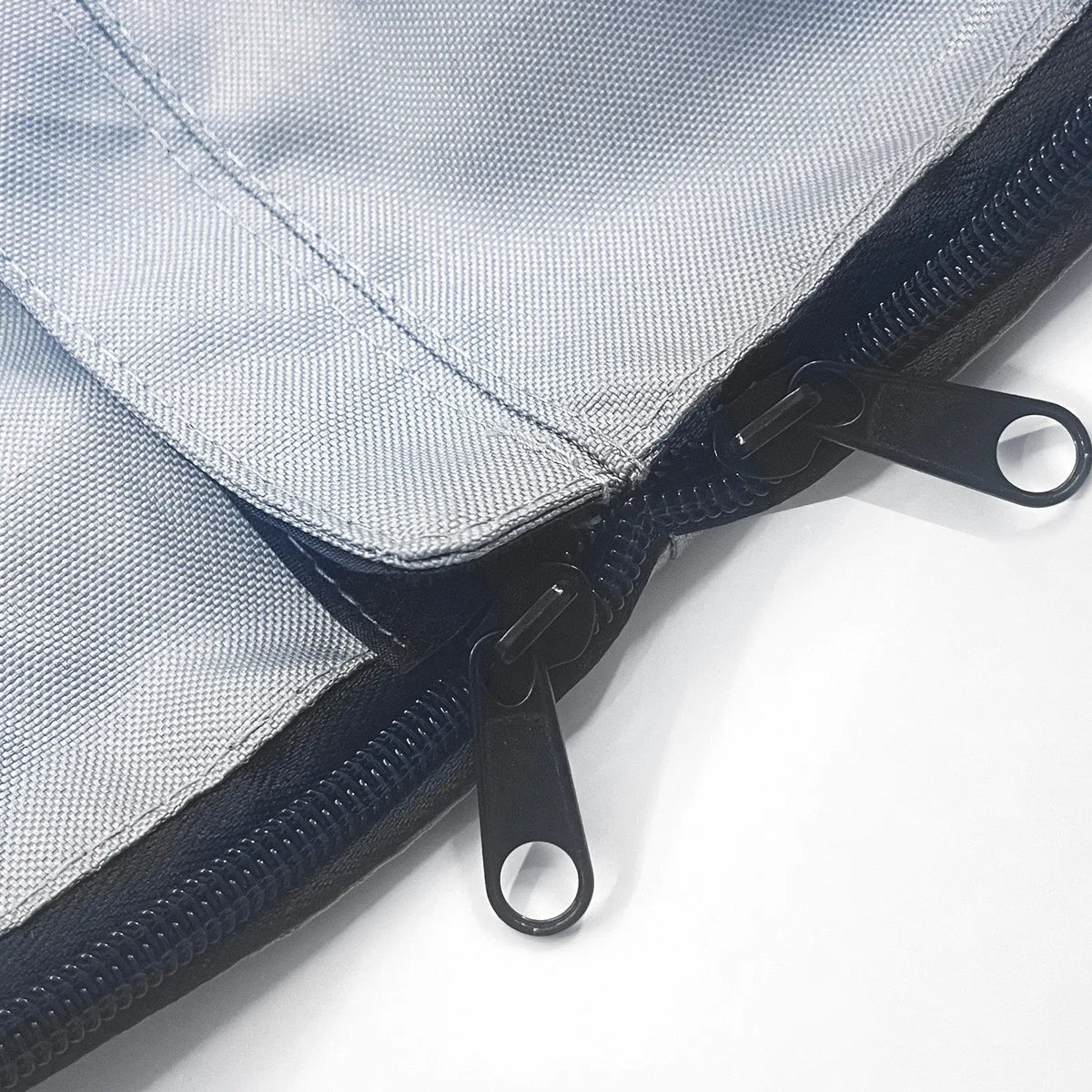 Close-up of SAVVYCRAFT® grey waterproof boat steering wheel cover showing heavy-duty zipper closure and reinforced stitching for marine durability