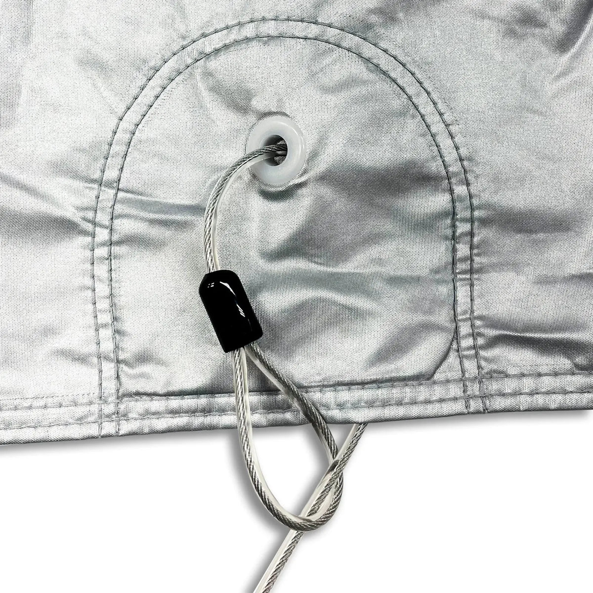 Strong braided steel cable lock fits through cover grommets to add protection and help secure the cover in heavy winds.
