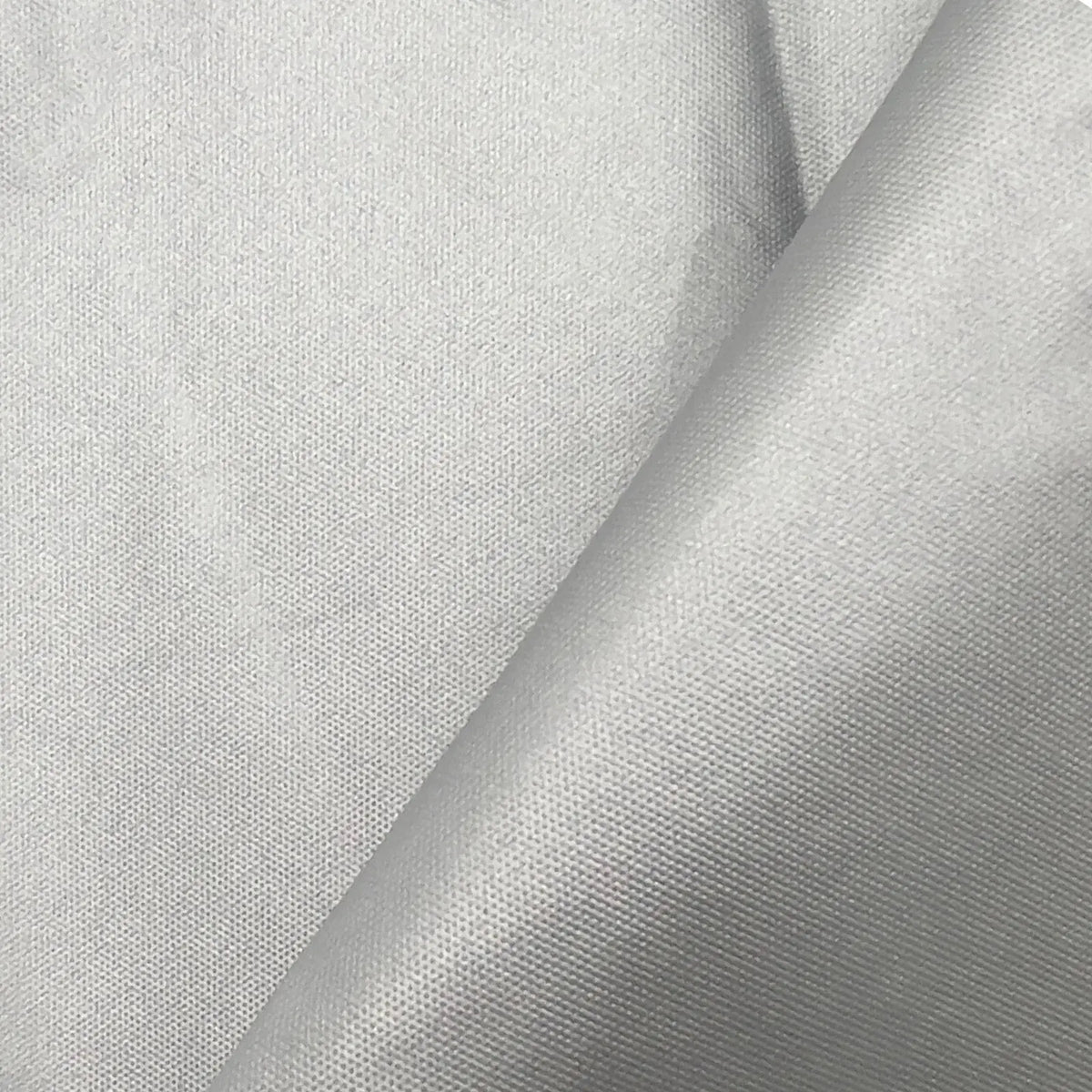 Close-up of silver, tightly woven polyester fabric with subtle texture, highlighting its durable and high-quality weave.