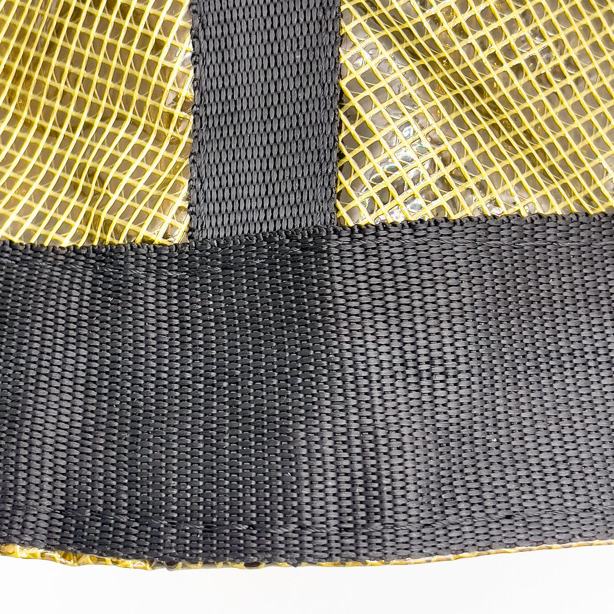 Close-up of brown nylon drift sock sea anchor with reinforced black webbing and attachment loop for kayak and boat drift control