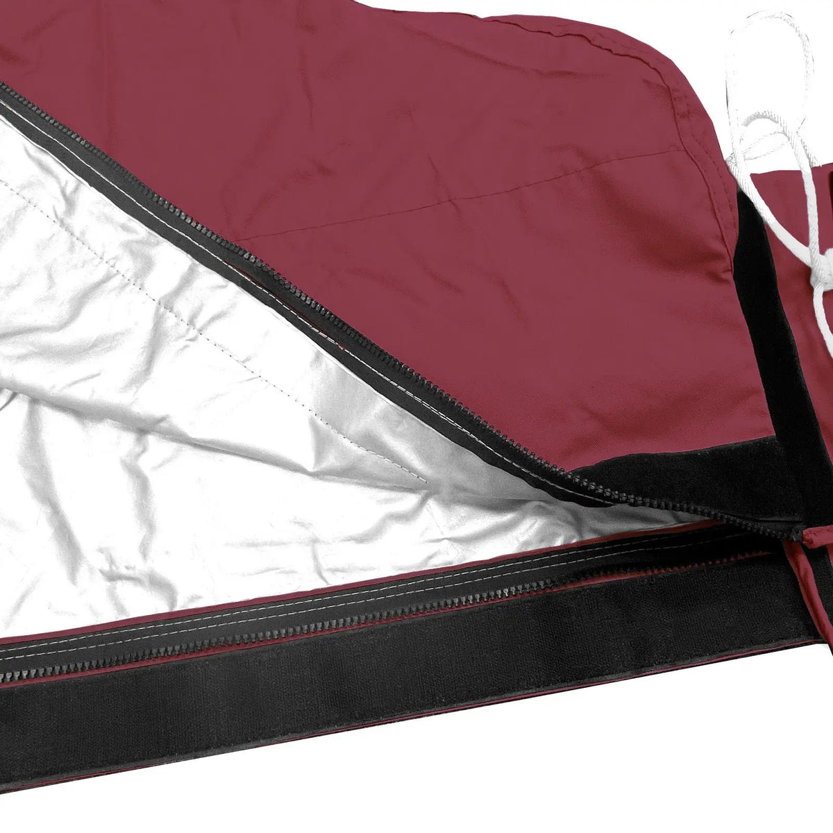 Heat-reflective interior lining with full-length zipper on burgundy waterproof mainsail boom cover