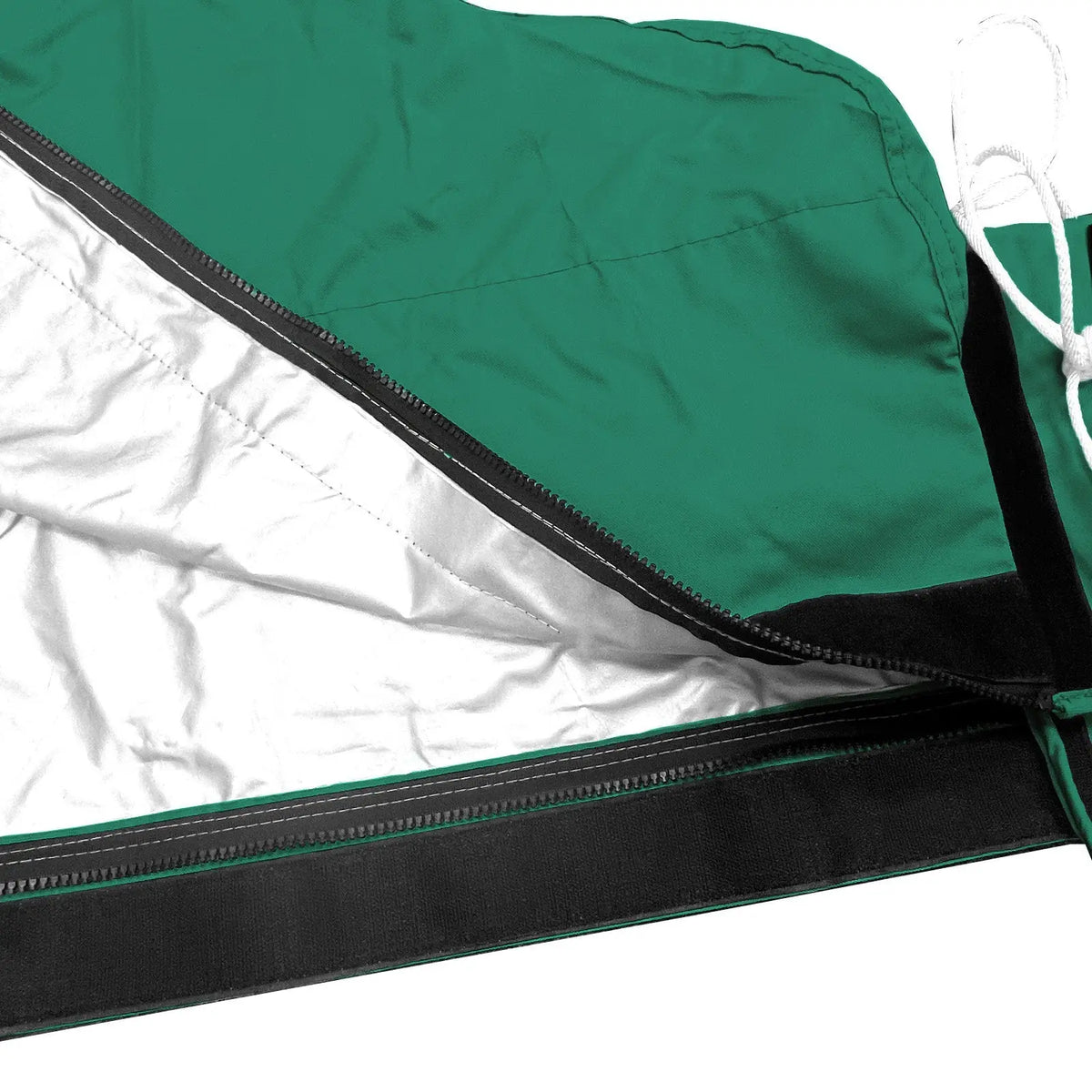 Heat-reflective interior lining with full-length zipper on green waterproof mainsail boom cover