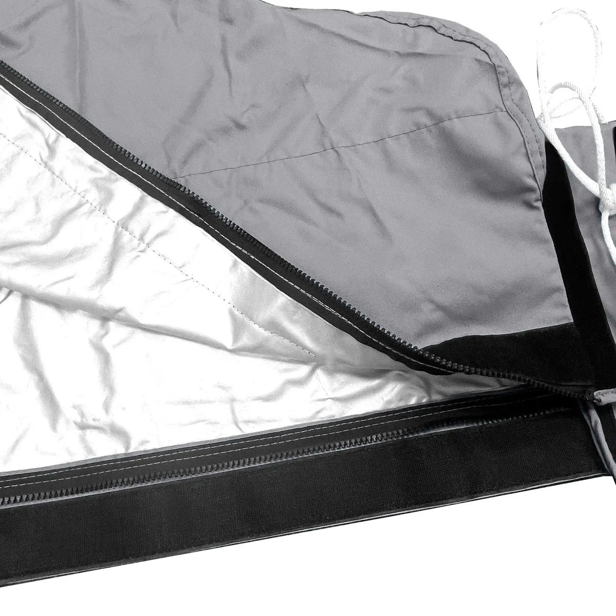 Heat-reflective interior lining with full-length zipper on grey waterproof mainsail boom cover