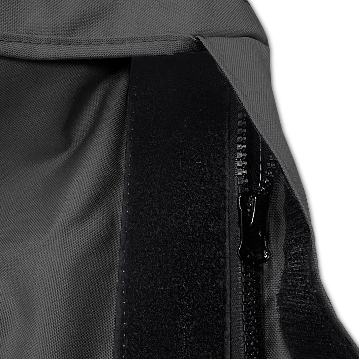 Velcro storm flap covering heavy-duty zipper on black waterproof sailboat boom cover