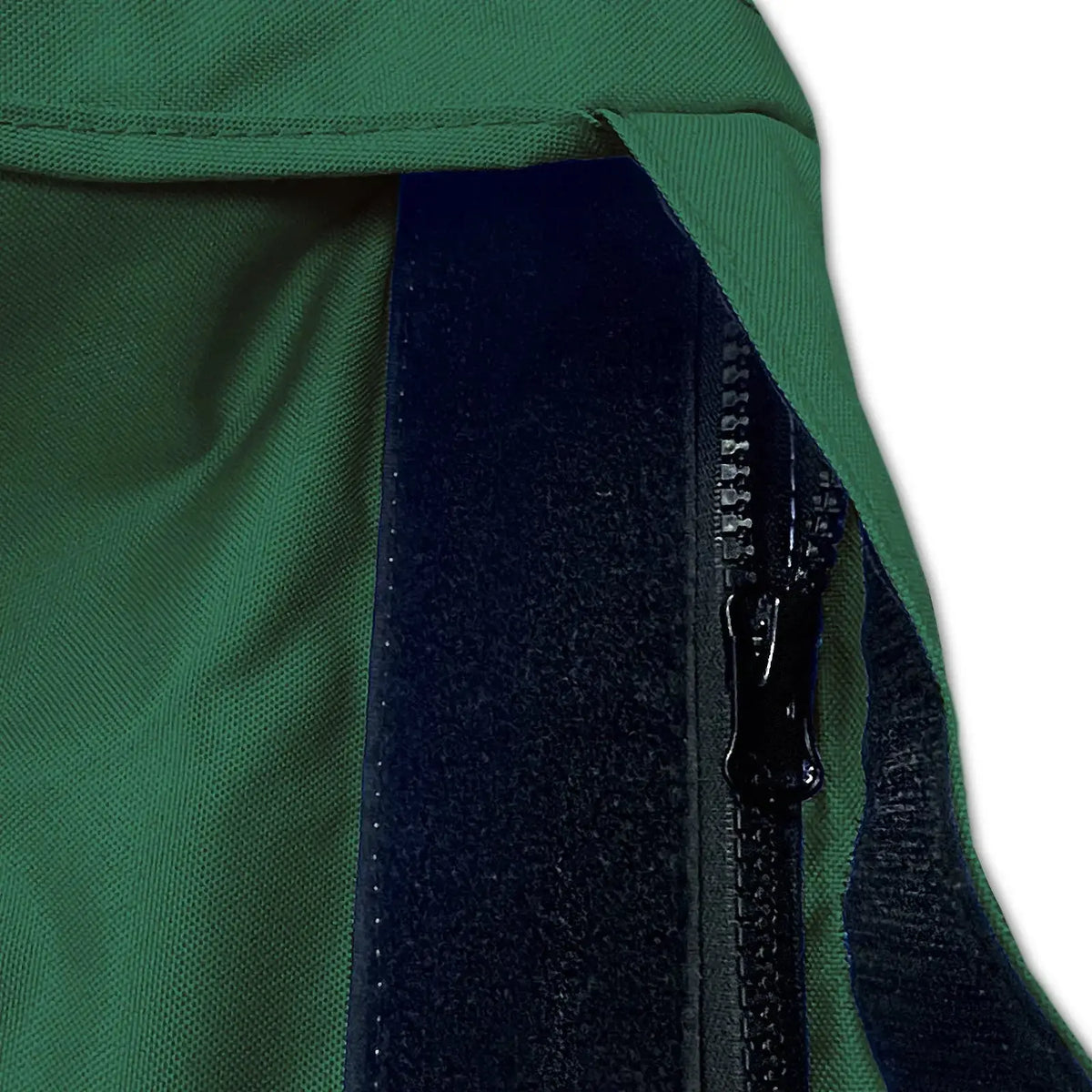 Velcro storm flap covering heavy-duty zipper on green waterproof sailboat boom cover