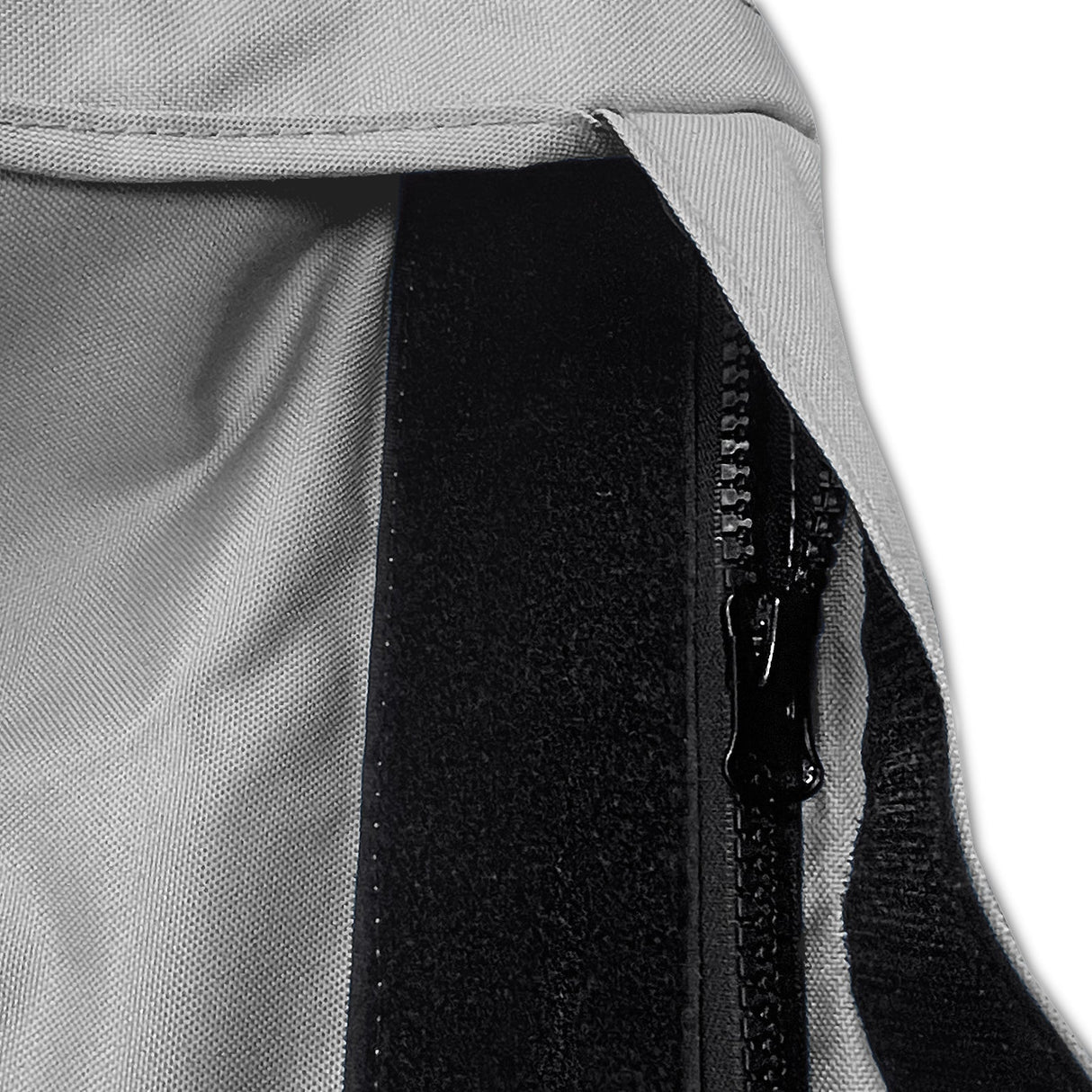 Velcro storm flap covering heavy-duty zipper on grey waterproof sailboat boom cover