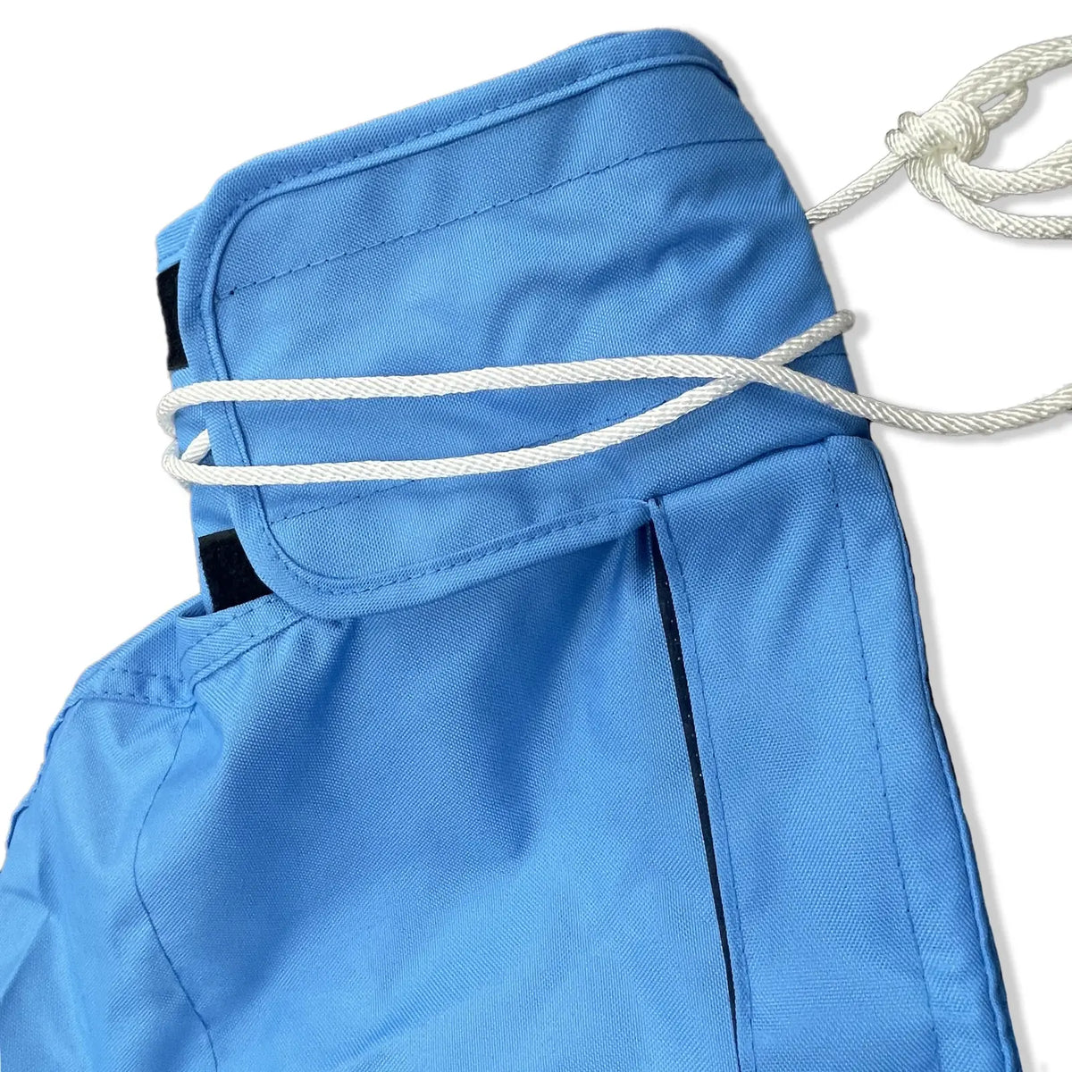 Tie-up string and reinforced top section of waterproof blue sailboat mainsail boom cover