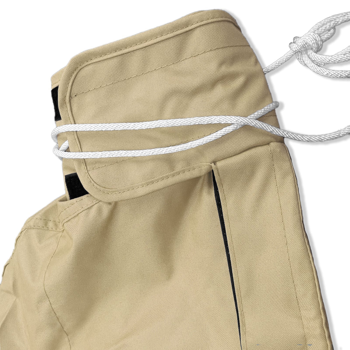 Tie-up string and reinforced top section of waterproof beige sailboat mainsail boom cover