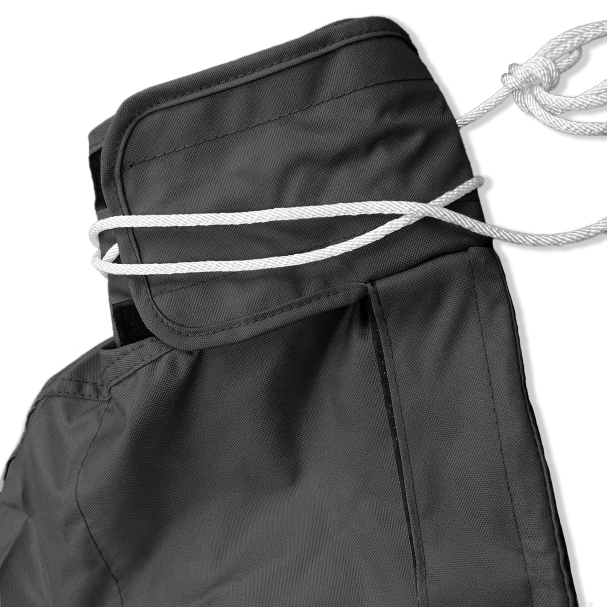 Tie-up string and reinforced top section of waterproof black sailboat mainsail boom cover