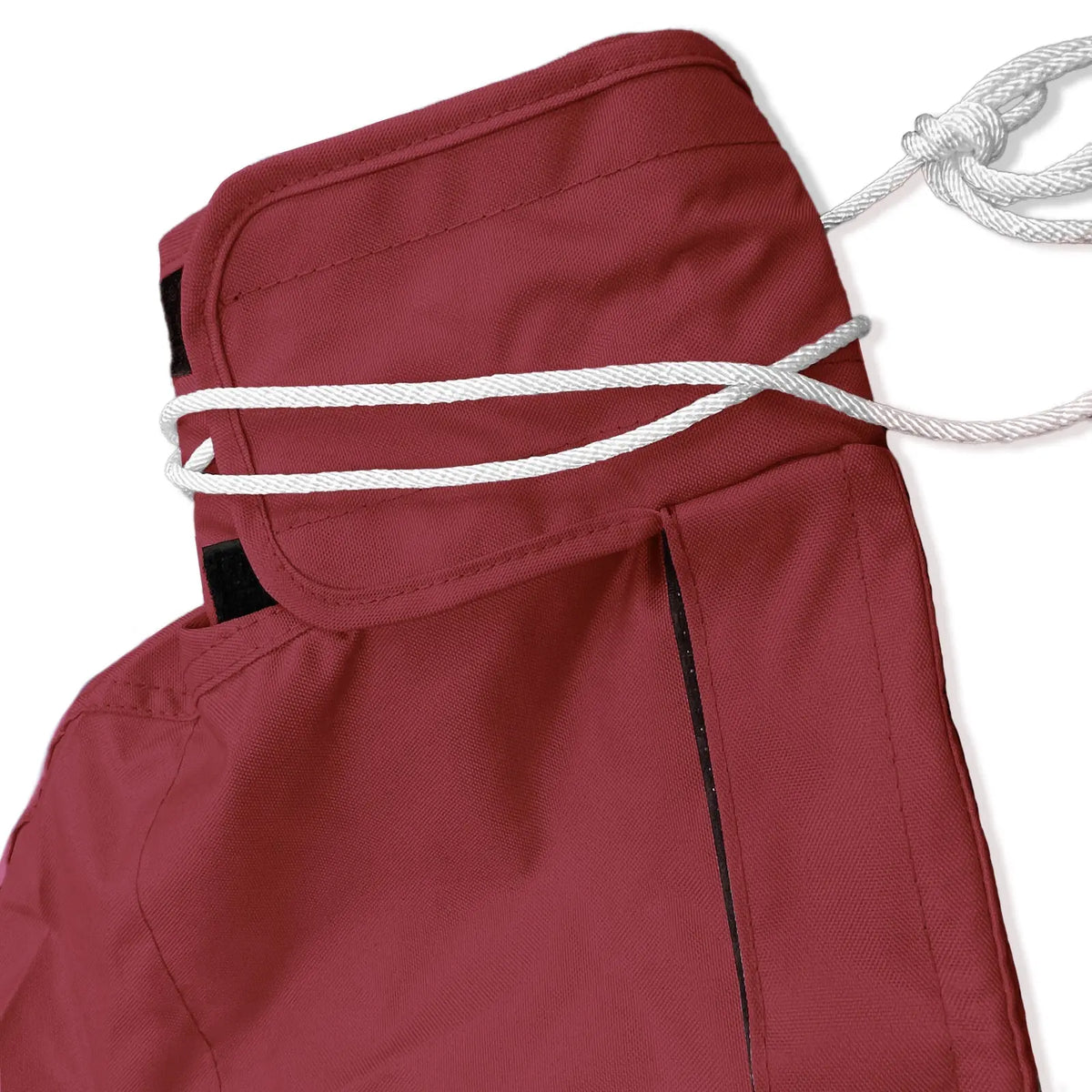 Tie-up string and reinforced top section of waterproof black sailboat mainsail boom cover