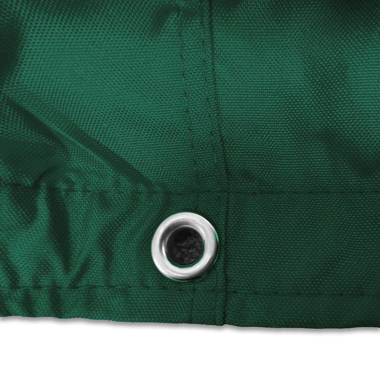 Stainless steel grommet on green waterproof sailboat boom cover for drainage and ventilation