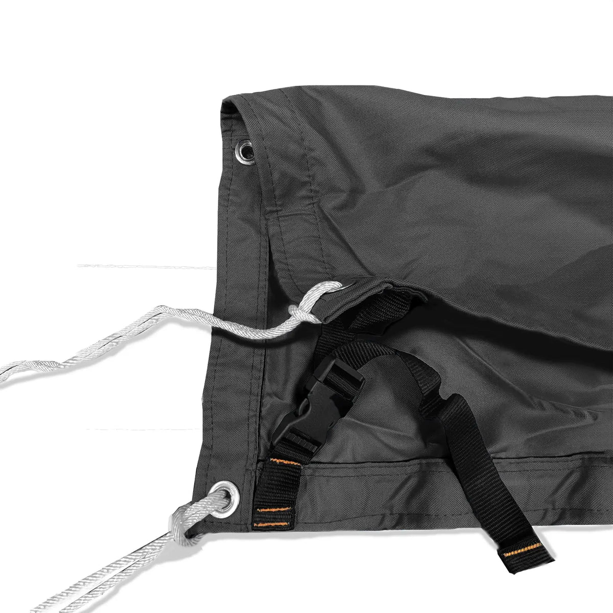 Adjustable tie-down straps and drawstring closure on black waterproof sailboat boom cover for secure fit
