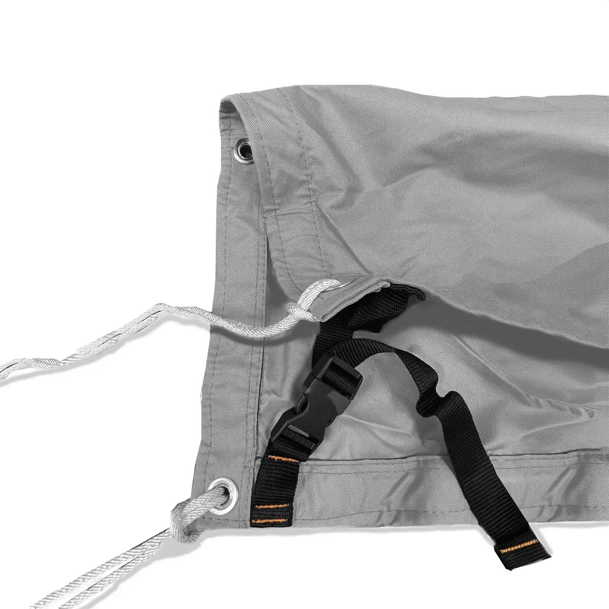 Adjustable tie-down straps and drawstring closure on grey waterproof sailboat boom cover for secure fit