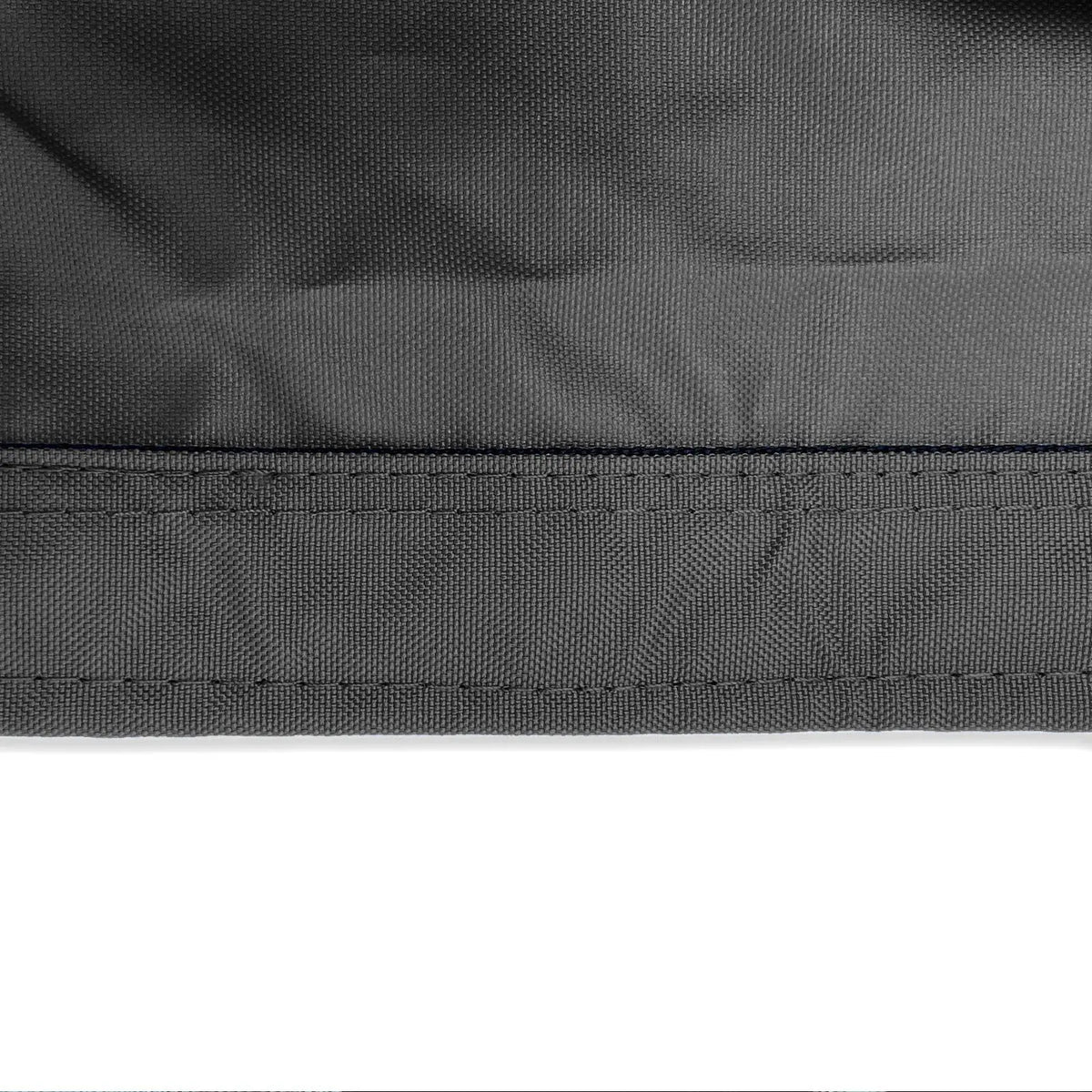 Reinforced double-stitched hem on waterproof black sailboat boom cover fabric