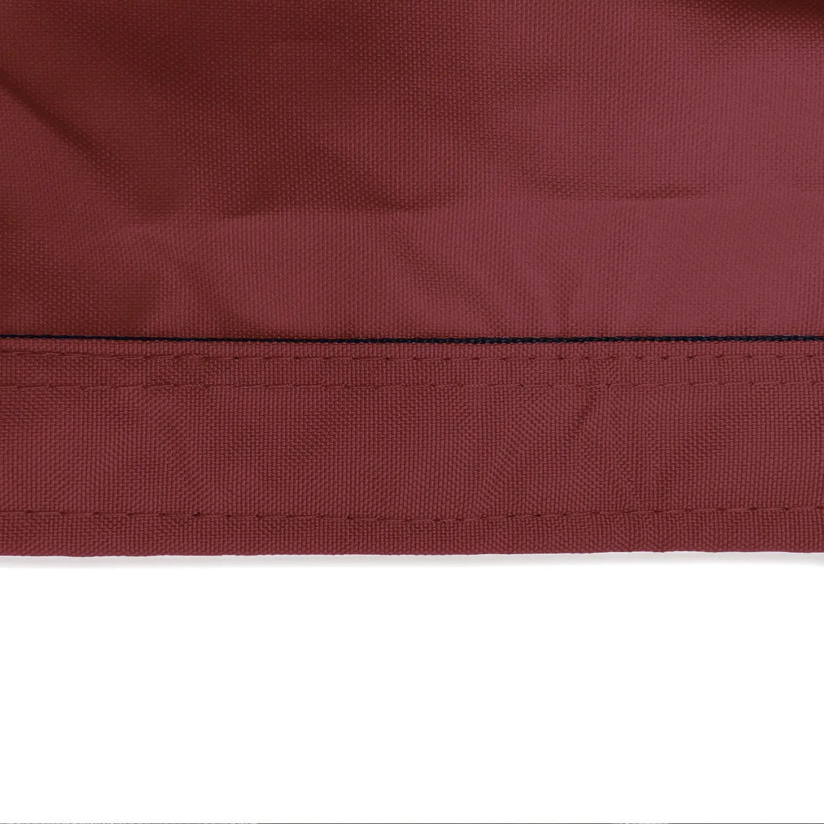 Reinforced double-stitched hem on waterproof burgundy sailboat boom cover fabric