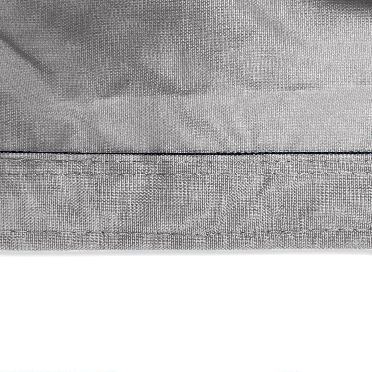 Reinforced double-stitched hem on waterproof grey sailboat boom cover fabric