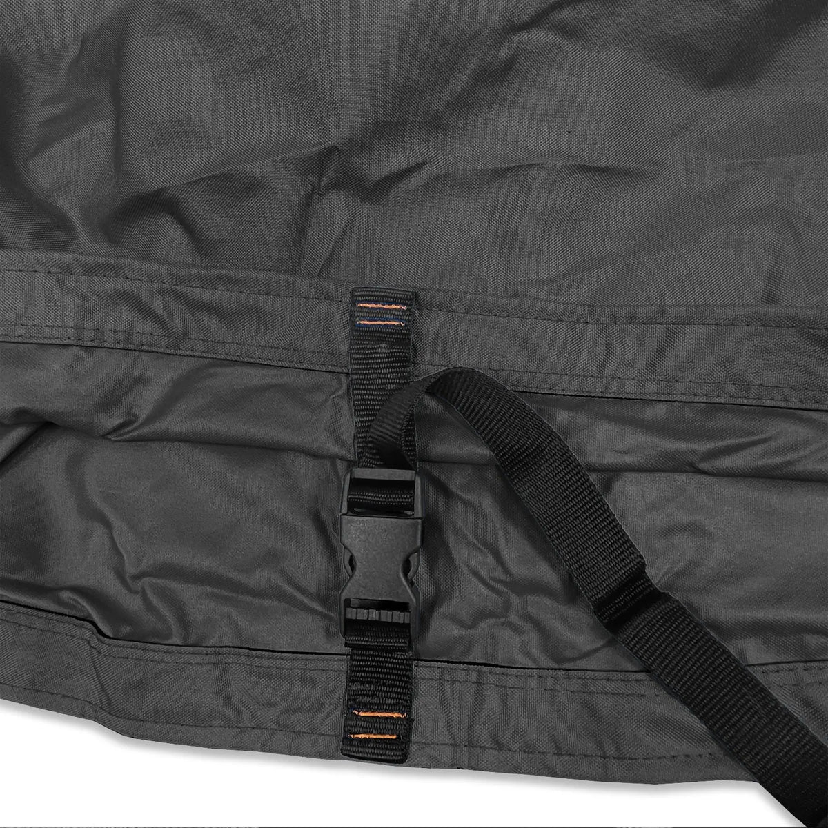 Adjustable buckle strap with reinforced stitching on black waterproof sailboat boom cover
