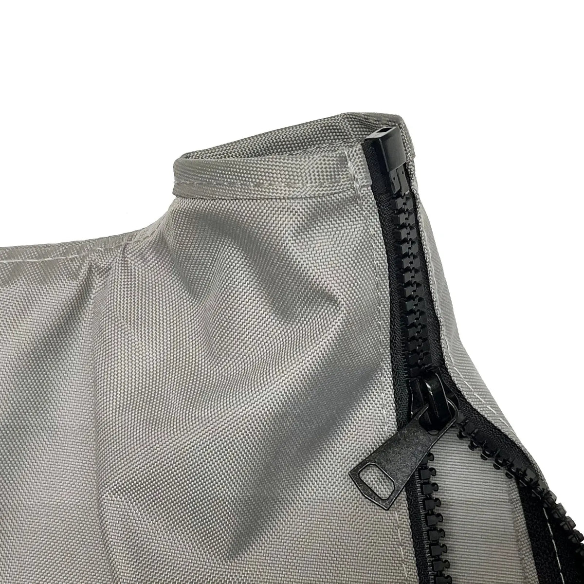 Close-up of heavy-duty black zipper on durable grey jib sail bag made from weather-resistant fabric, designed for marine environments with reinforced stitching and rugged construction for secure sail storage