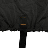 Close-up of strap and elastic hem on a black vehicle cover, designed to secure the cover tightly underneath the vehicle and prevent shifting, flapping, or wind lift during outdoor storage.