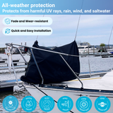 sailboat docked at marina with black marine-grade canvas jib sail bag covering furled head sail, surrounded by rigging lines and stainless steel railings, showcasing durable sail protection and recreational sailing setup in harbor conditions