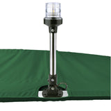 Green Bimini top replacement canvas with cutout for marine navigation light.