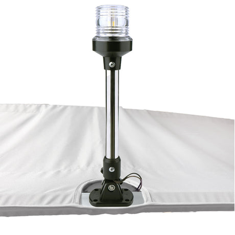 White Bimini top replacement canvas with cutout for marine navigation light.