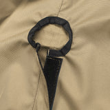 Close-up of SAVVYCRAFT® tan waterproof boat steering wheel cover showing elastic opening and reinforced fastening strap for secure marine fit