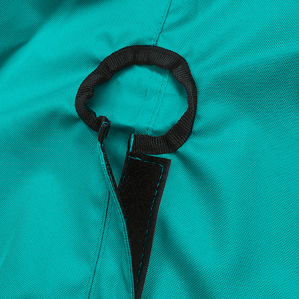 Close-up of SAVVYCRAFT® teal waterproof boat steering wheel cover showing elastic opening and reinforced fastening strap for secure marine fit