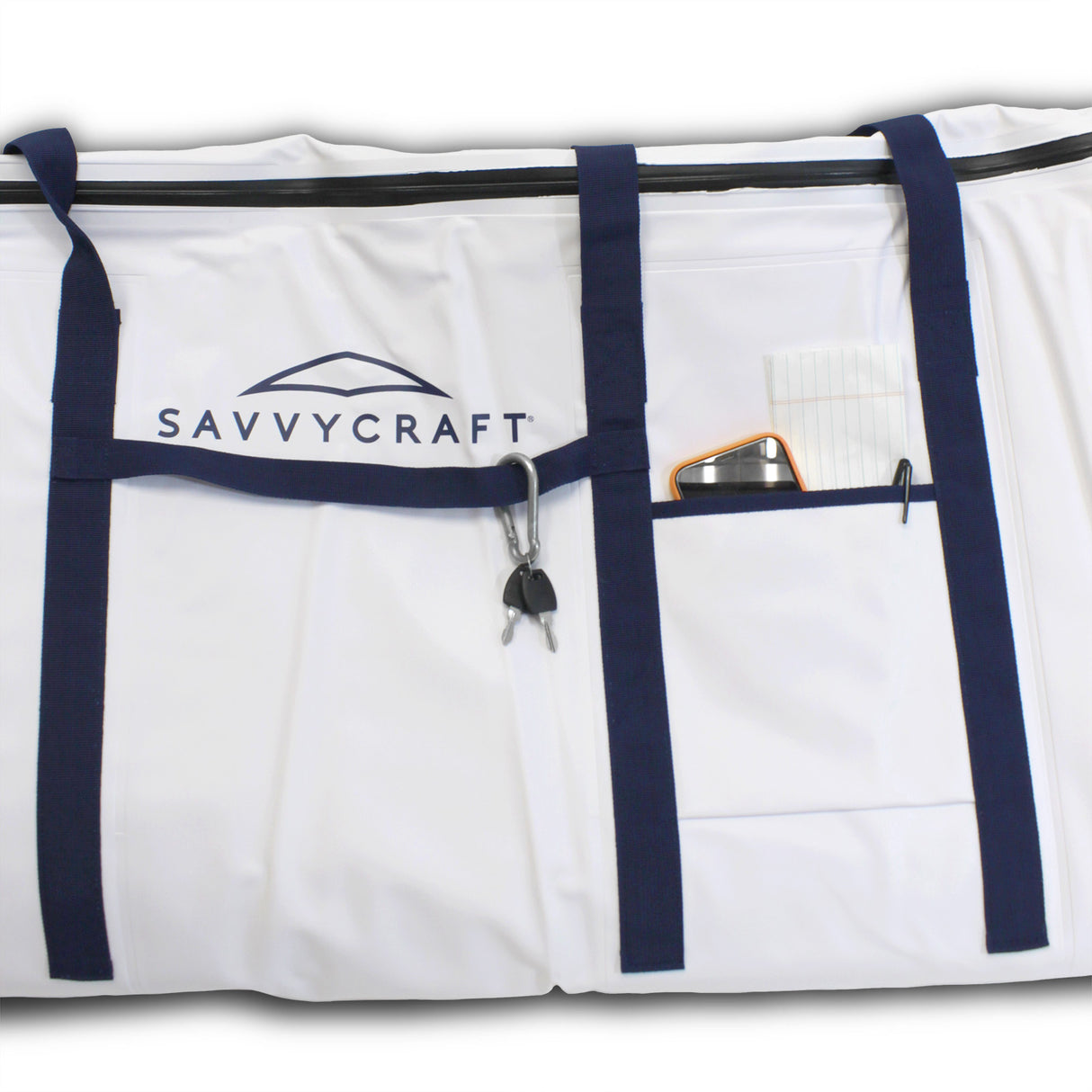 SavvyCraft marine soft cooler bag detail featuring a front gear pocket, heavy-duty blue webbing straps, and an accessory attachment loop for fishing tools