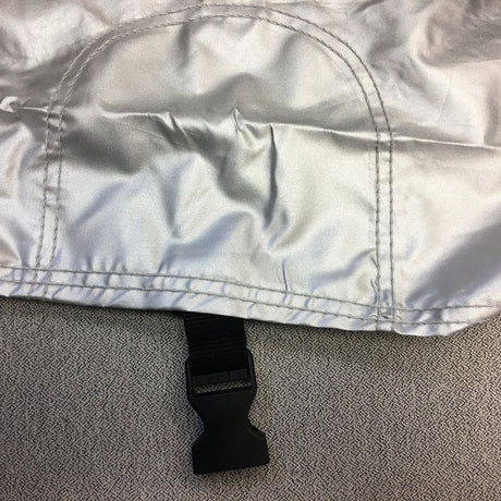 Sewn-in undercarriage straps with click-close buckles for maximum security and a snug, protective fit.