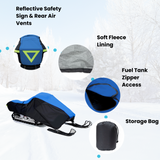 Durable snowmobile cover featuring reflective safety taping and rear air vents to reduce lofting, soft fleece lining, fuel tank zipper access, and a heavy-duty storage bag.